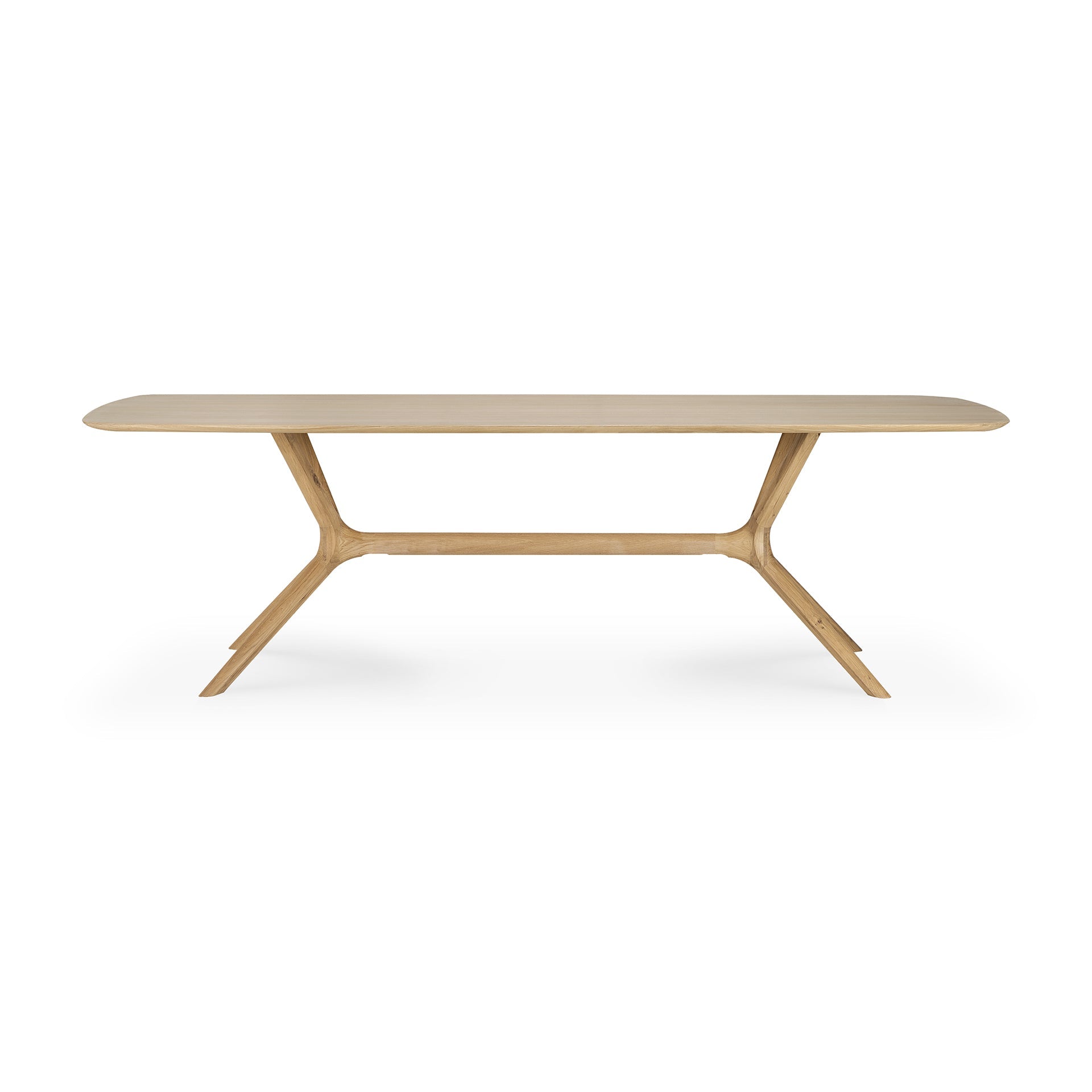 Table à manger minimaliste en chêne massif avec structure pied-plateau intégrée pour salle à manger