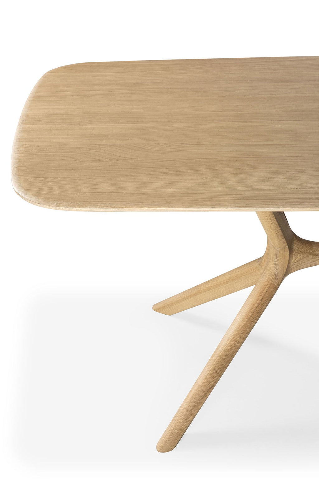Table à manger minimaliste en chêne massif avec structure pied-plateau intégrée pour salle à manger