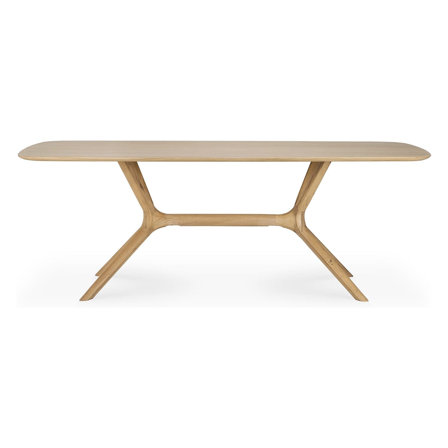 Table à manger minimaliste en chêne massif avec structure pied-plateau intégrée pour salle à manger