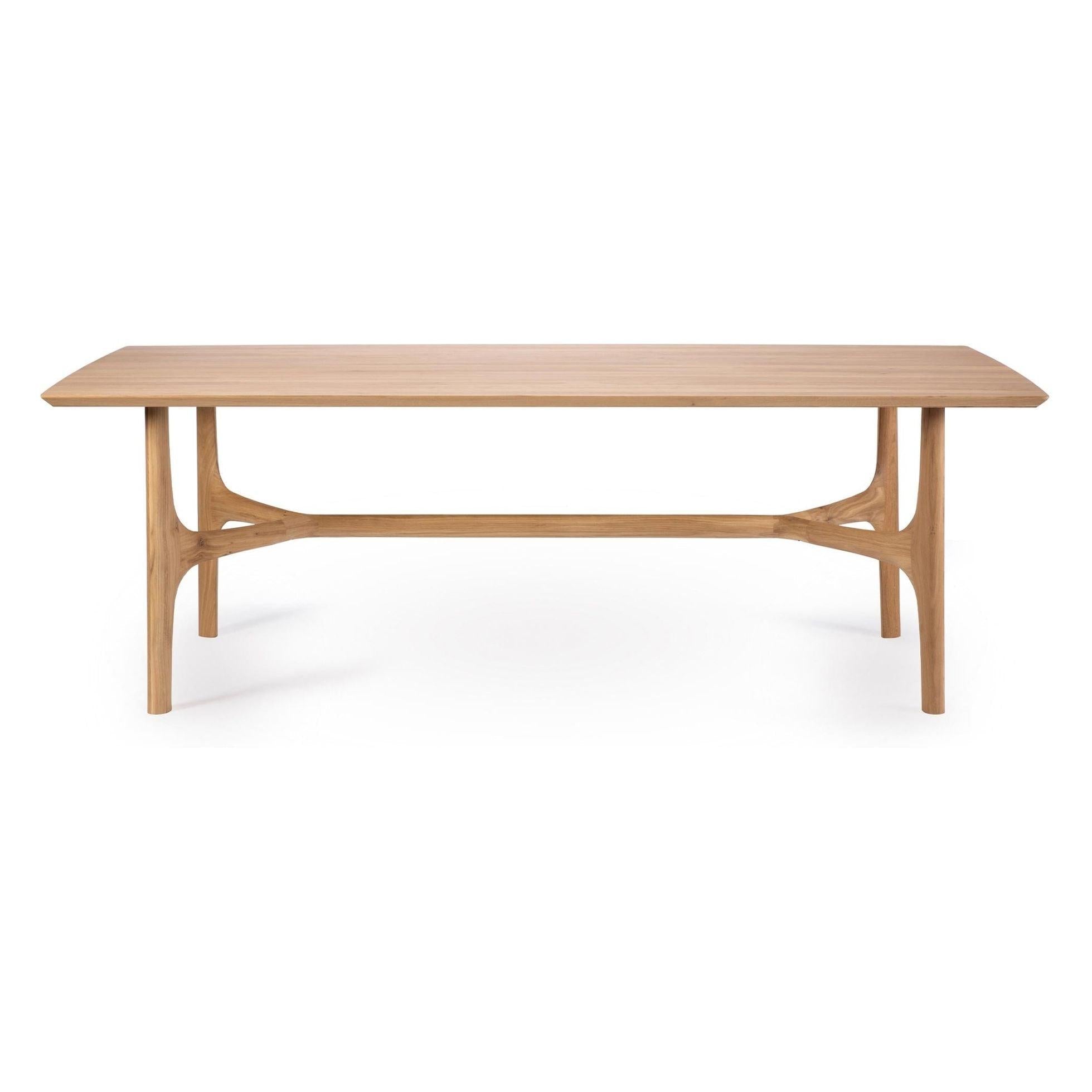 Table de salle à manger contemporaine en chêne massif avec pieds sculptés fluides