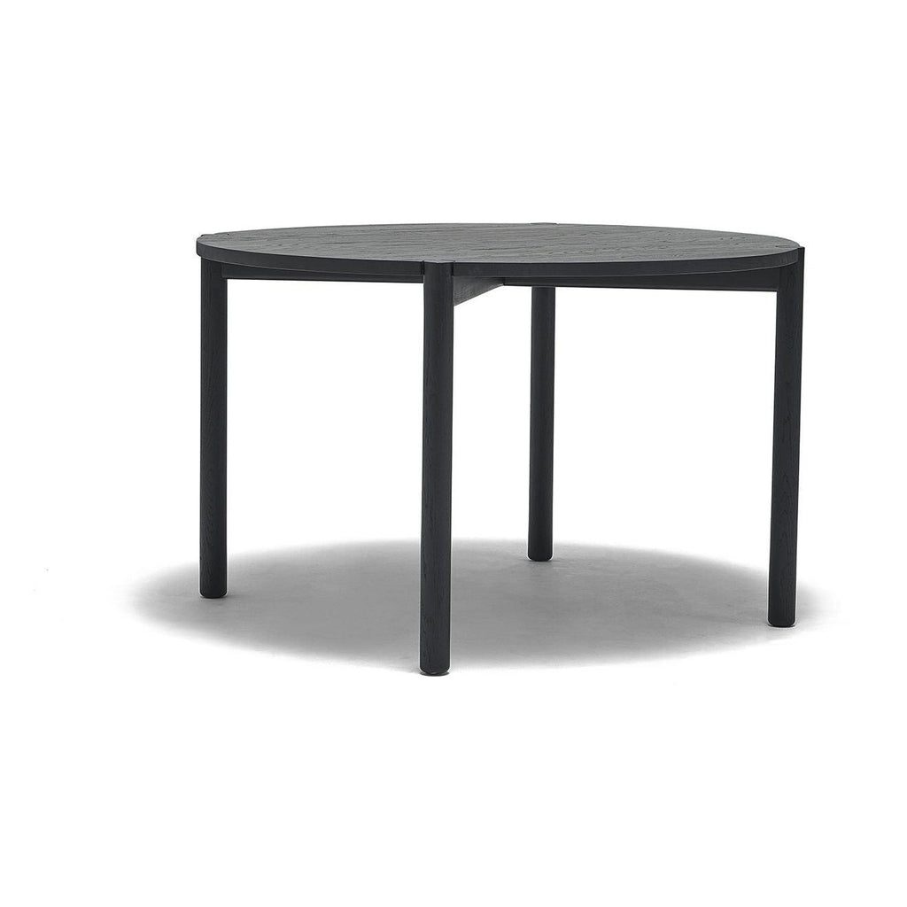 Table à manger ronde en chêne massif biologique avec plateau incurvé et pieds arrondis pour salle à manger