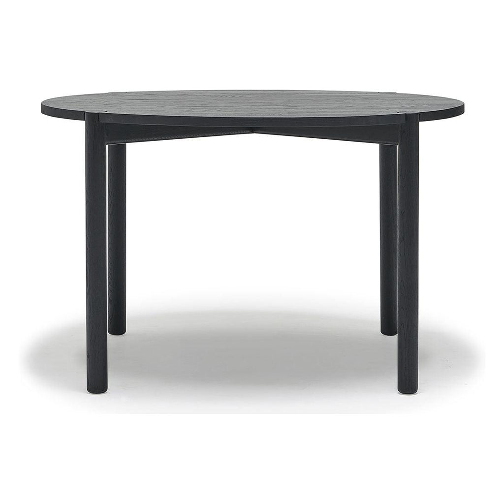 Table à manger ronde en chêne massif biologique avec plateau incurvé et pieds arrondis pour salle à manger