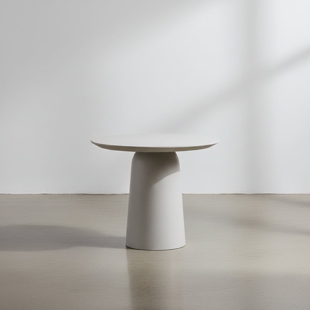 Table à manger ronde contemporaine en béton avec finition ivoire naturel pour l'intérieur et l'extérieur